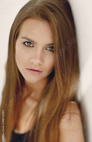 closeup. face of a beautiful girl with long hair