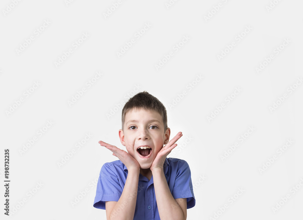 Portrait of smiling teen boy. Happy teenager wearing t-shirt. Portrait of smiling teen boy. Happy teenager wearing t-shirt.