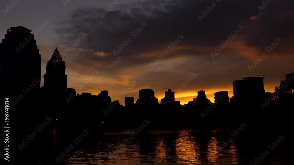 Sunset at downtown, foreground is a marsh, at Bangkok, Thailand. Sunset at downtown, foreground is a marsh, at Bangkok, Thailand.