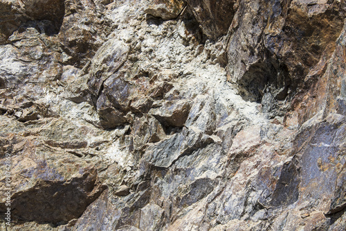 Geologic rock background composition full of veins