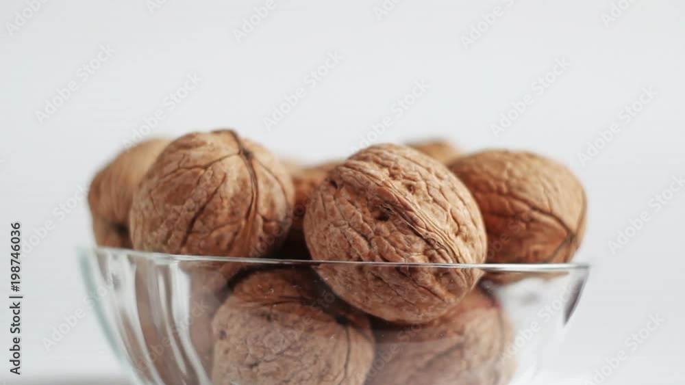 Bowl with nuts on spinning wheel Bowl with nuts on spinning wheel
