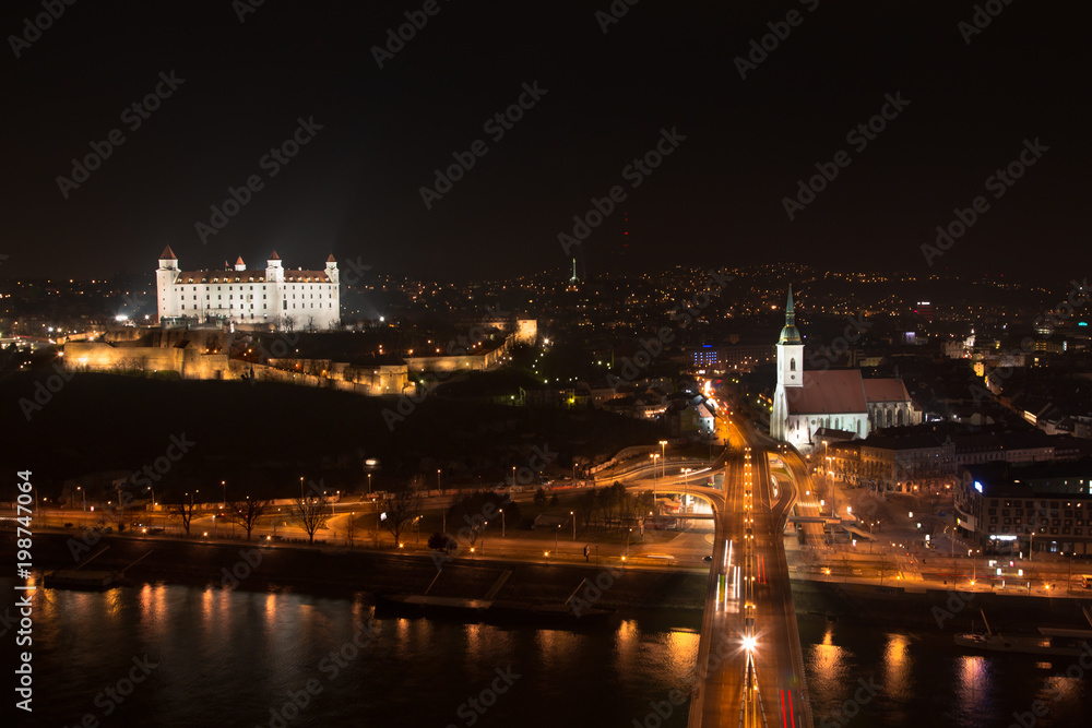 Bratislava City skyline aerial view. Timelapse from UFO bridge at night