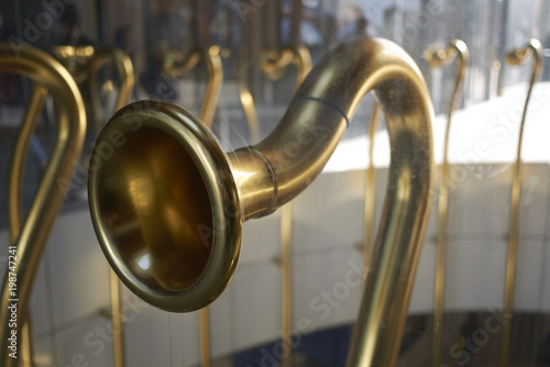 Milan, Italy - March 09, 2018: Detail of trumpet, Urban Art of Alberto Garutti in Gae Aulenti square photo