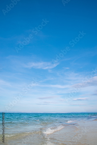 Young lady relaxing in a chair on a beach at sunny day © grooveriderz