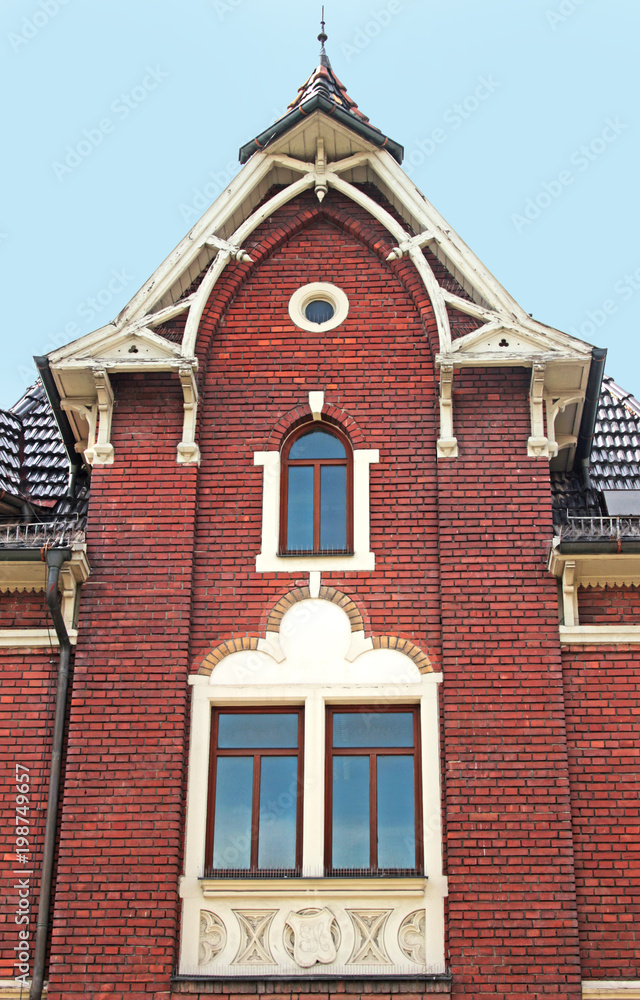 facade of a beautiful old brick stone house facade of a beautiful old brick stone house