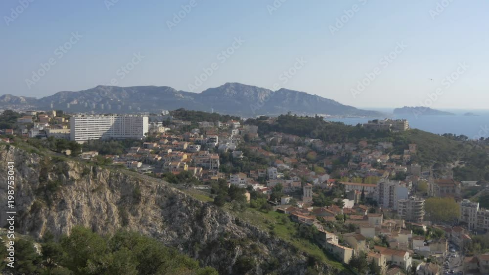Buildings and trees on a hill Buildings and trees on a hill