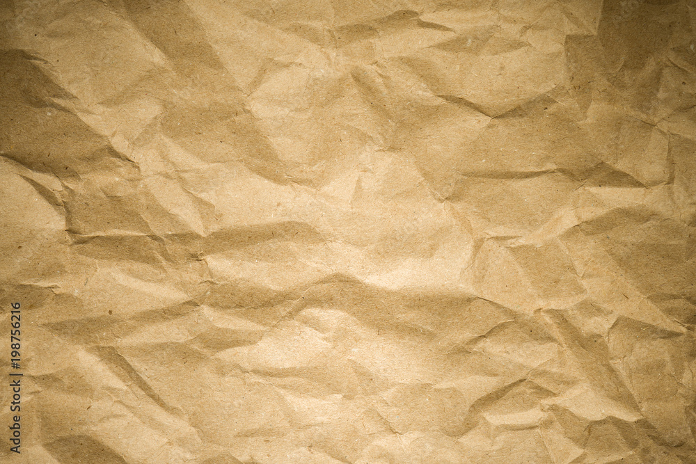 Obraz premium Crumpled kraft paper texture background 