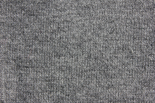 Gray Knit Textured Background of Dark Grey Colored Sweater. Fabric Material Design Backdrop, Empty Textile Clothes Surface. Stylish Simple Pattern, Urban Apparel Canvas for Copy Space Template.