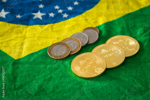 bitcoins on the background of the Brazilian flag