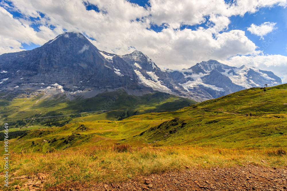 panoramic view on Eiger, Monch and Jungfrau in summer
