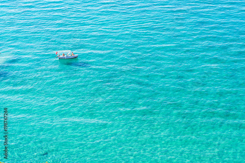 boat in the open sea © ilkay