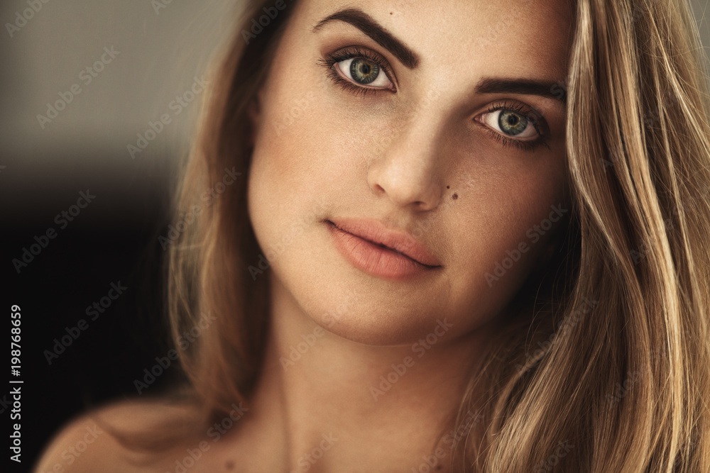 Obraz premium Elegant girl with a beautiful make-up. Blonde hair.