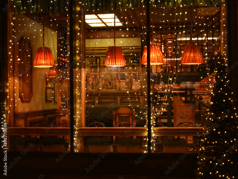 Beautiful cafe showcase on a winter evening