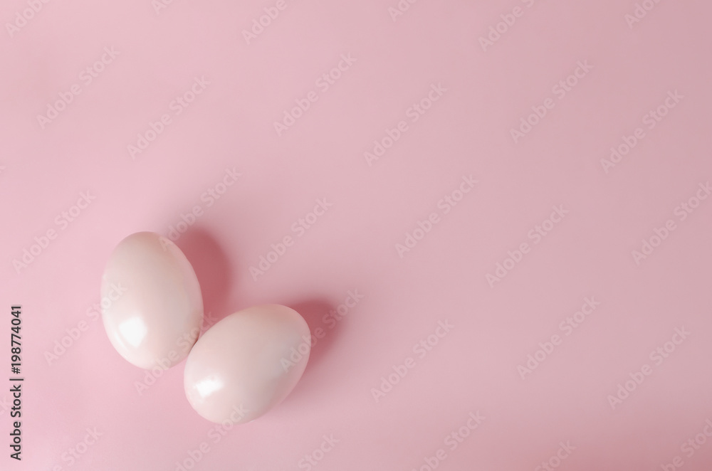Pink pastel easter eggs on blue background Pink pastel easter eggs on blue background