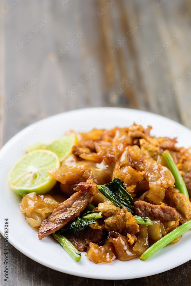 Thai food, stir fried rice noodles in soy sauce (Pad See Ew)