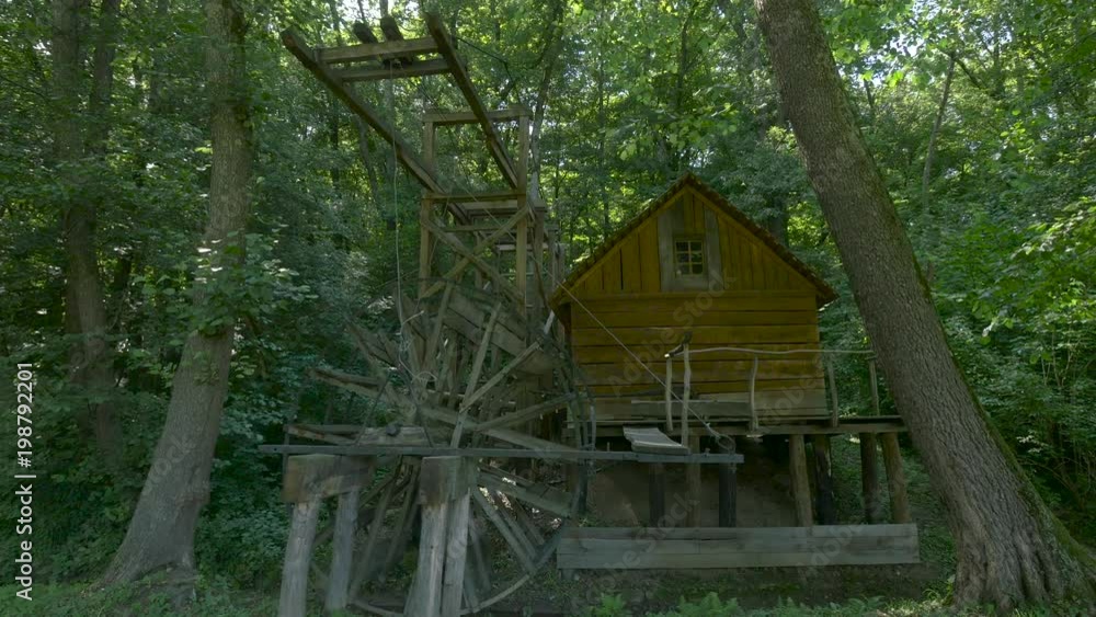 Traditional Romanian mill in the forest Traditional Romanian mill in the forest
