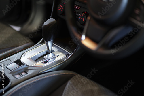 Automatic gear stick inside luxury car.
