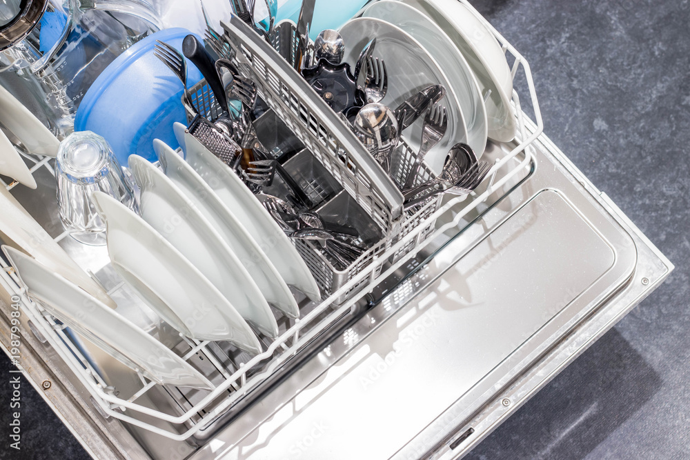 Open dishwasher with clean dishes Open dishwasher with clean dishes