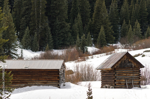 Wallpaper Mural Two Cabins in a Snowy Mountain Forest Torontodigital.ca