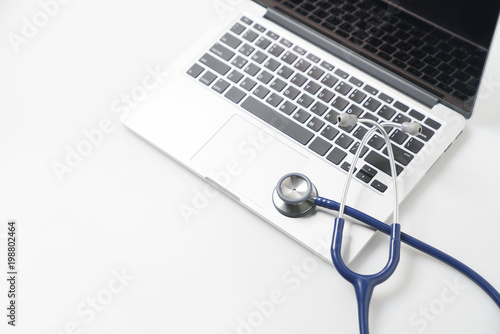Stethoscope on laptop, Healthcare and medicine or computer antivirus protection and repair maintenance service concept