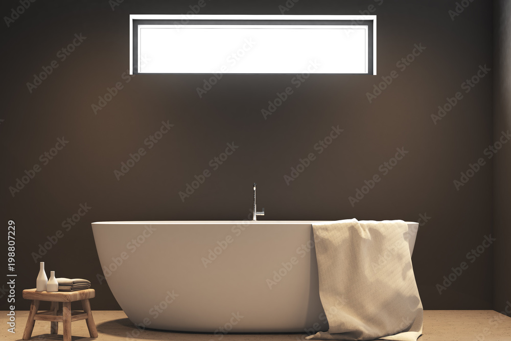 Close up of a white bathtub, gray bathroom Close up of a white bathtub, gray bathroom