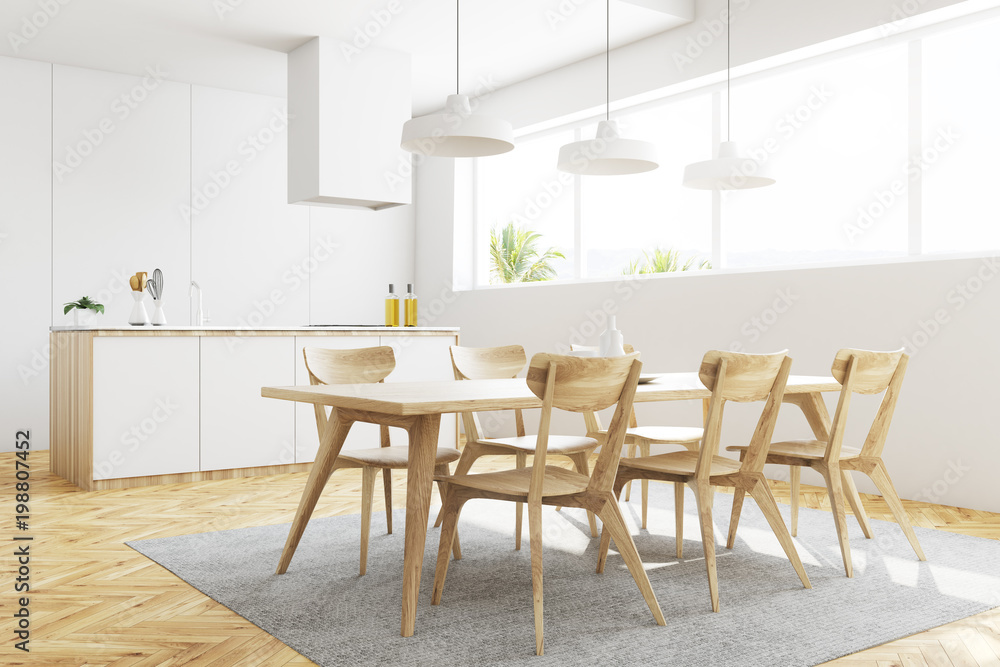 Fototapeta premium White kitchen and dining room corner