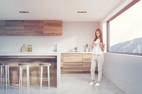 White brick kitchen interior, side view toned