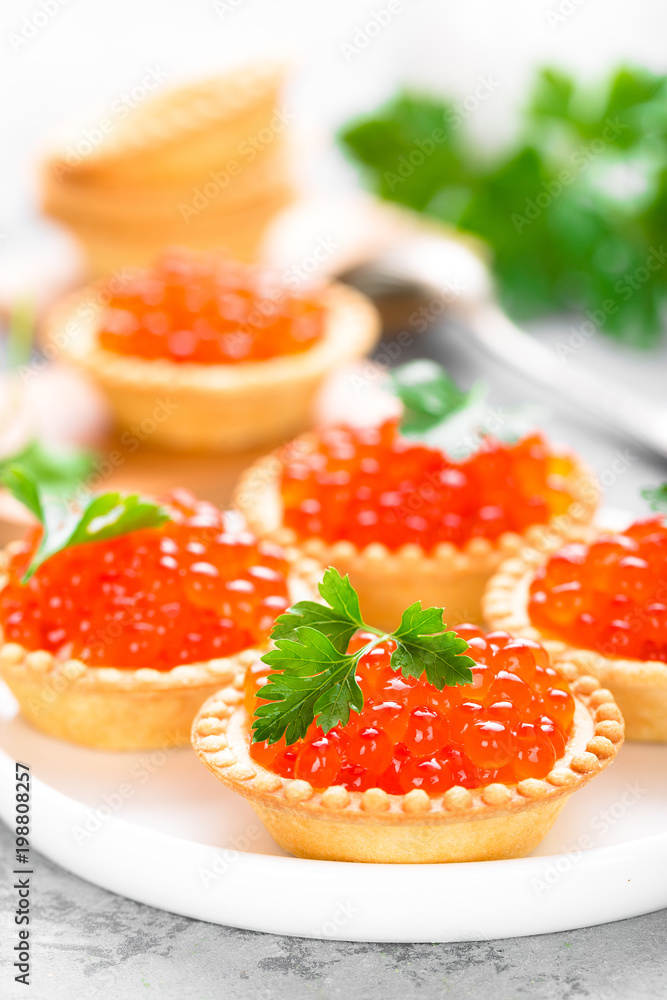 Tartlets with red salmon fish caviar, salmon caviar. Caviar Tartlets with red salmon fish caviar, salmon caviar. Caviar