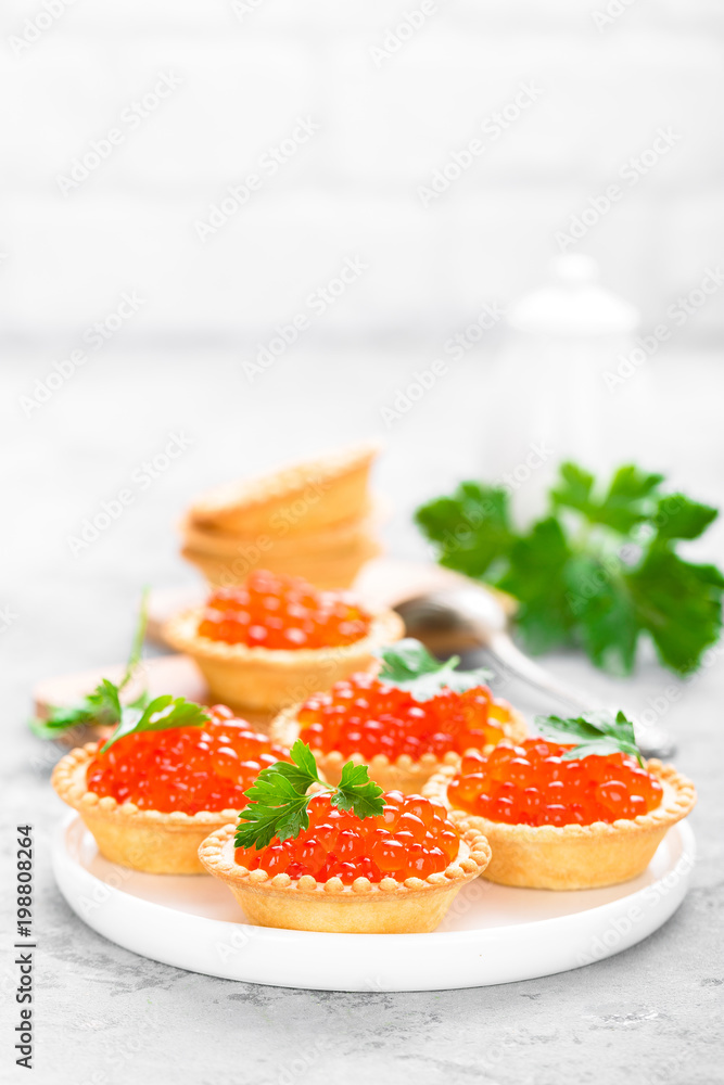 Tartlets with red salmon fish caviar, salmon caviar. Caviar Tartlets with red salmon fish caviar, salmon caviar. Caviar