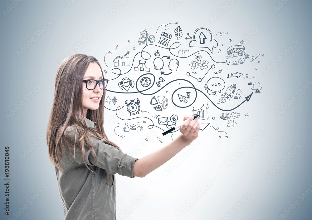 Smiling woman with a marker, business plan Smiling woman with a marker, business plan
