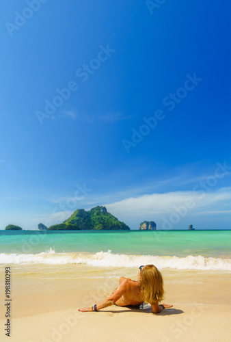 woman resting at the tropical island of Poda in  Thailand © Netfalls
