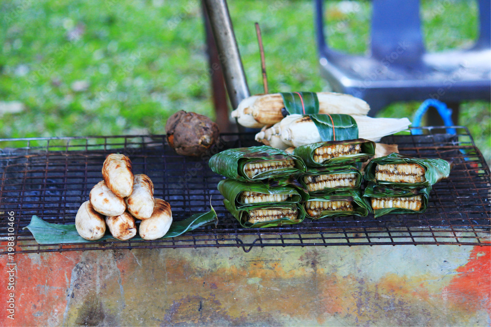 Sticky Rice With Taro Grill Sweet Sticky rice with Sweet Taro core and wrap by Banana Leaf ...