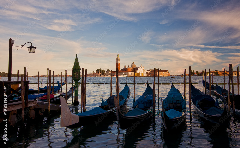 Gondola dock at sunset. Venice, Italy.