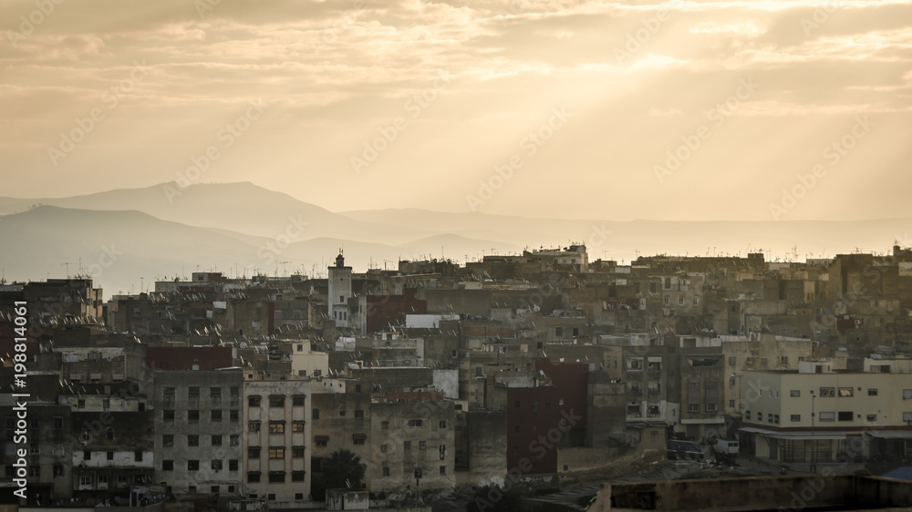 Morning in a Morocco city  Fez. Mountains in the background