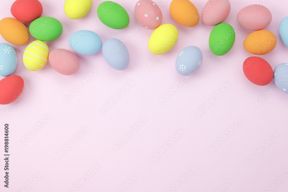 Table top view shot of decorations Happy Easter holiday background concept.Flat lay colorful bunny eggs on modern pink paper at office desk.Blank space design for mock up & add text.pastel tone. Table top view shot of decorations Happy Easter holiday background concept.Flat lay colorful bunny eggs on modern pink paper at office desk.Blank space design for mock up & add text.pastel tone.