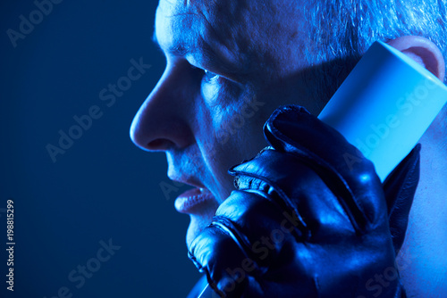 Photography Criminal Wearing Leather Gloves Carrying Out Phone Fraud