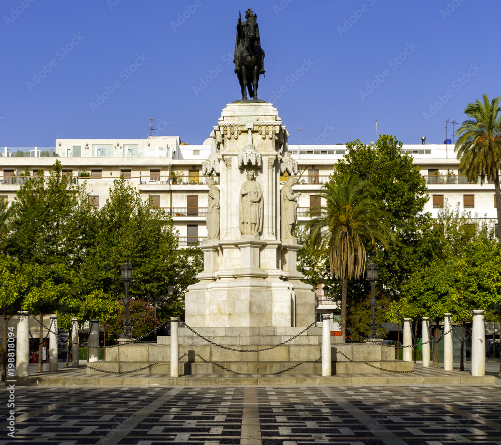New Square (Plaza Nueva) and monument of Fernando III The Saint (Fernando III El Santo) in Seville, Spain.