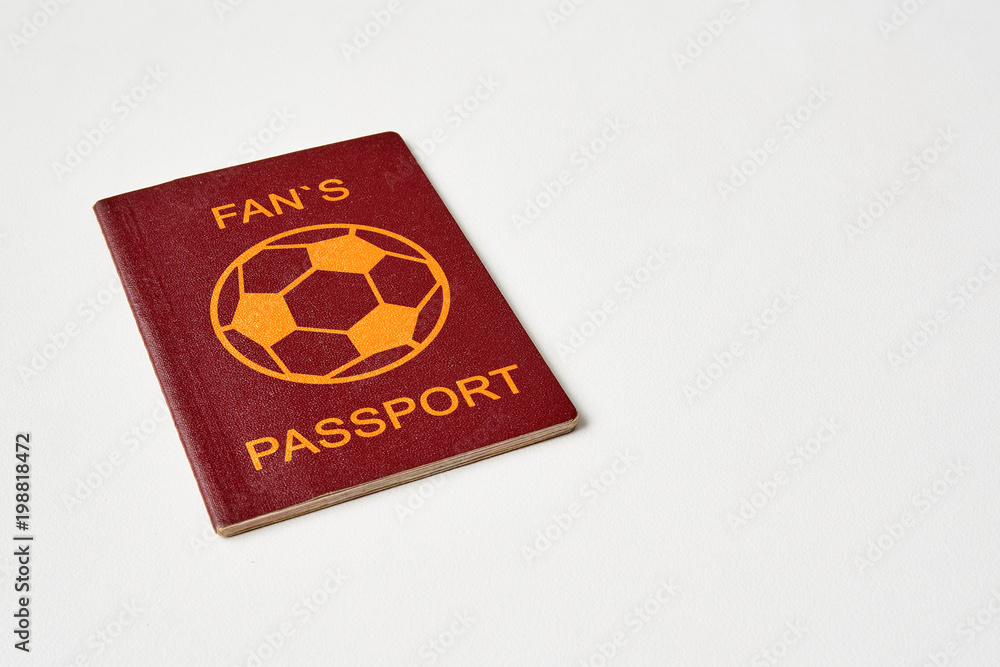 One abstract fan passport on white table One abstract fan passport on white table