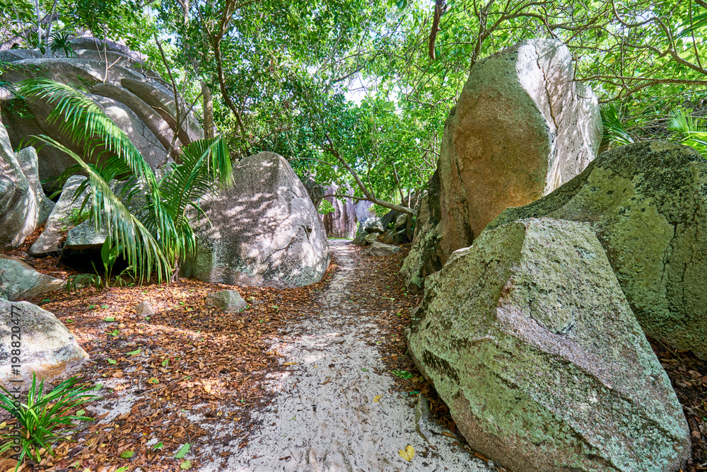 Anse Source d'Argent, granite rocks at beautiful beach on tropi Anse Source d'Argent, granite rocks at beautiful beach on tropi