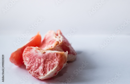 grapefruit slices on a white background