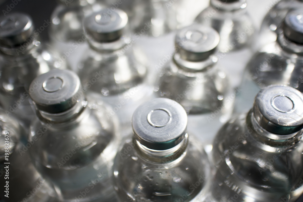 bottles with solutions on the medical table bottles with solutions on the medical table
