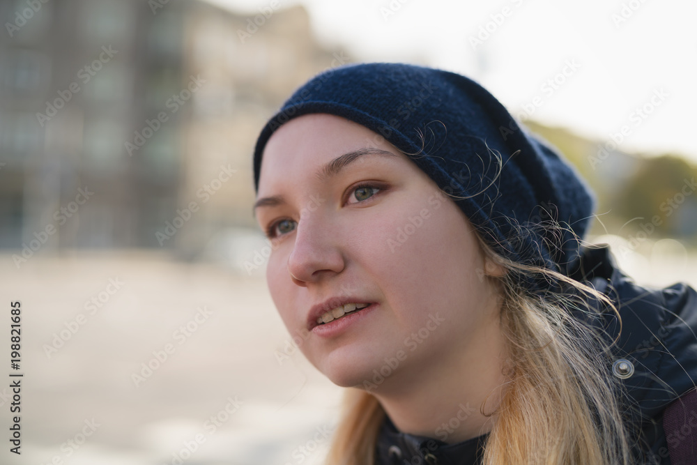 urban portrait of teen girl walking in the city in autumn or spring urban portrait of teen girl walking in the city in autumn or spring