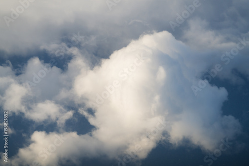 flying above the clouds in midday