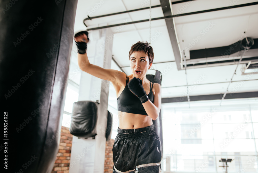 muscular woman succed in boxing. skillful sport. keep physical fit