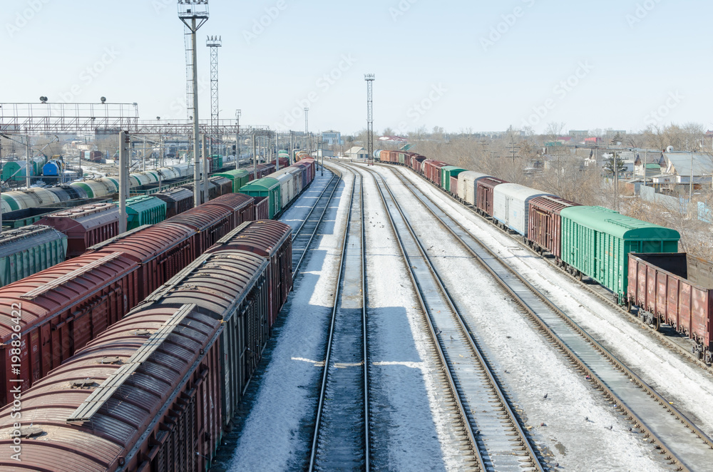 Passenger and freight rail transportation, railway industry.Cars on the platform.