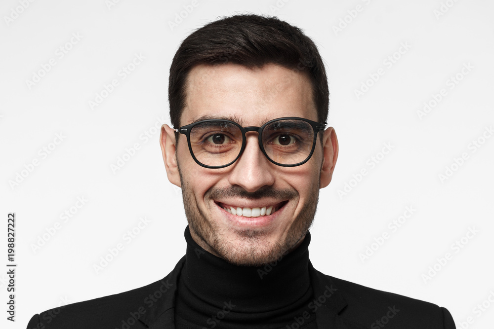 Close up portrait of art director or artist isolated on grey background
