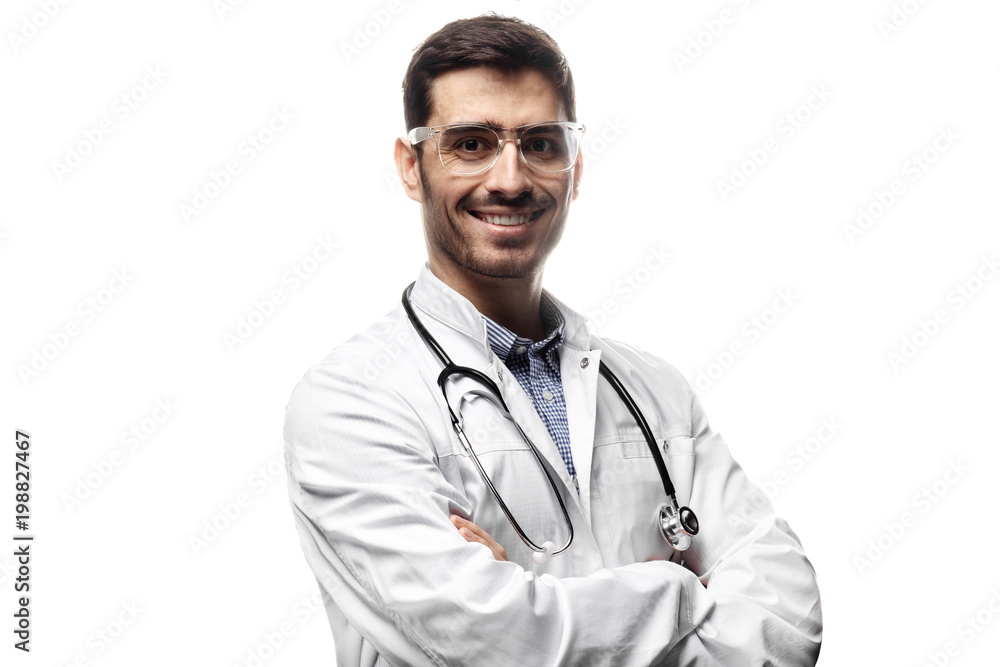 Portrait of man doctor with stethoscope around his neck, looking at the camera and smiling isolated on white background Portrait of man doctor with stethoscope around his neck, looking at the camera and smiling isolated on white background
