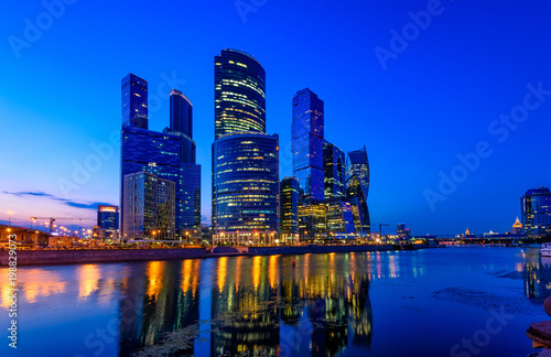 Skyscrapers of Moscow City business center and Moscow river in Moscow at night  Russia