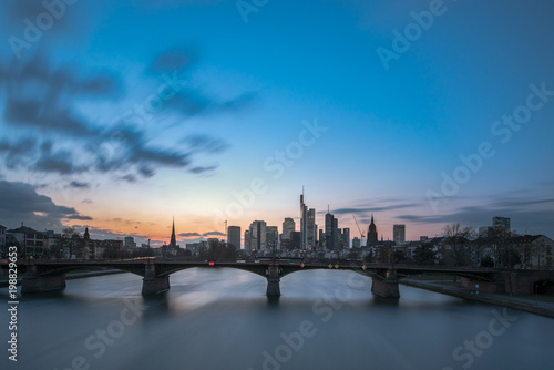 The skyline of the banking metropolis in Frankfurt am Main during a beautiful sunset. Frankfurt, Germany / 26 February 2018