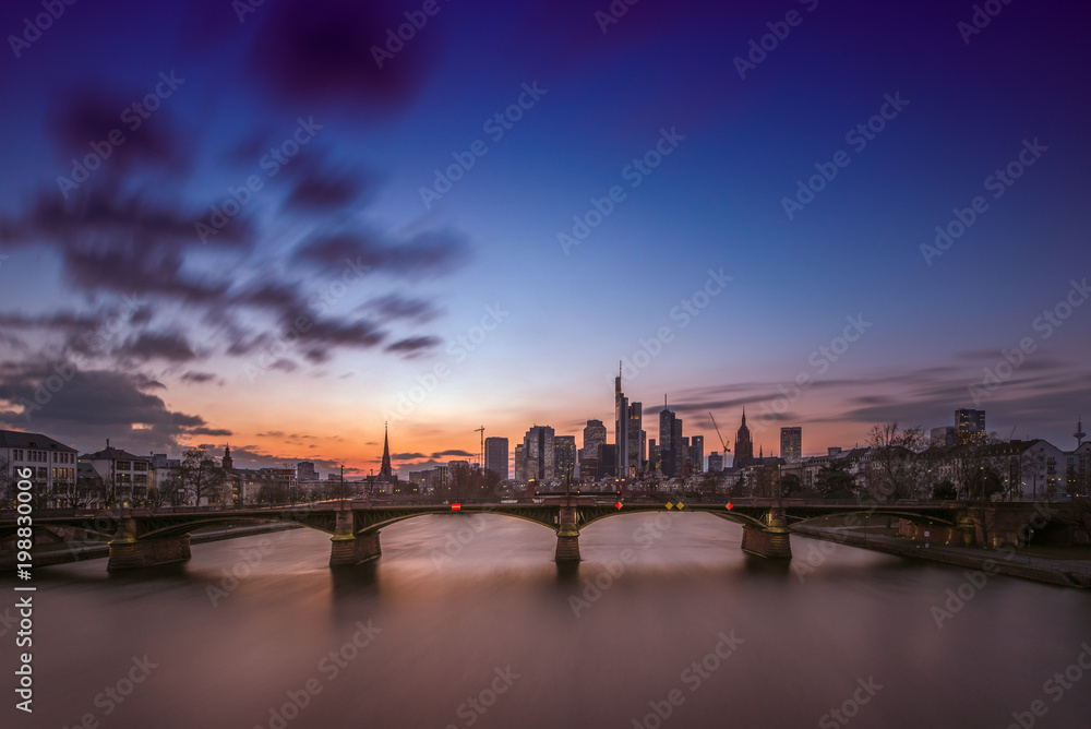 The skyline of the banking metropolis in Frankfurt am Main during a beautiful sunset. Frankfurt, Germany / 26 February 2018